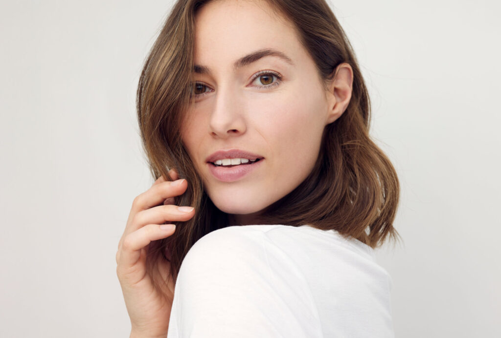 Portrait,Of,Beautiful,Naturally,Brunette,Woman,,Smiling,And,Looking,Sexy